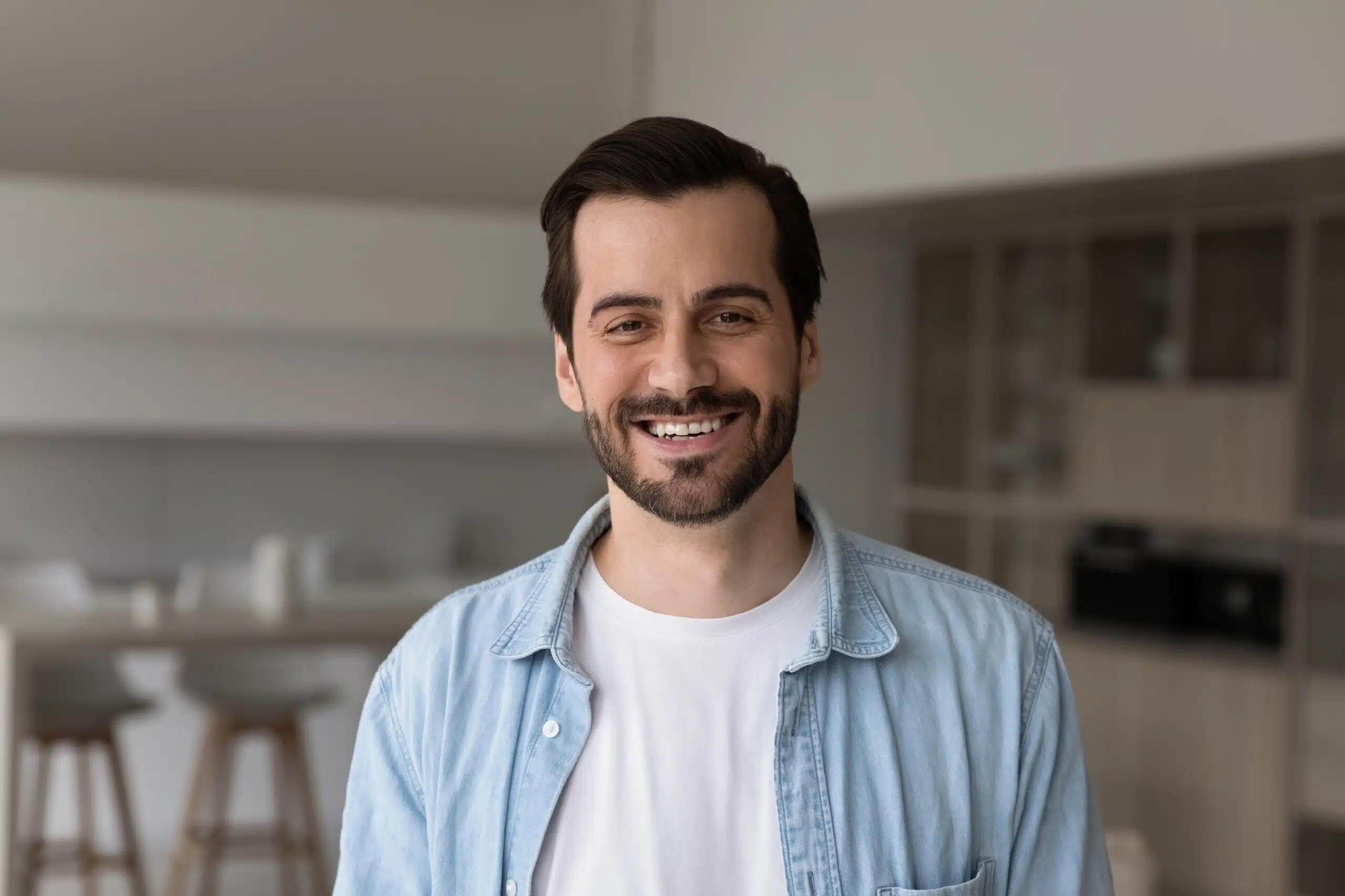 Smiling man in a casual shirt
