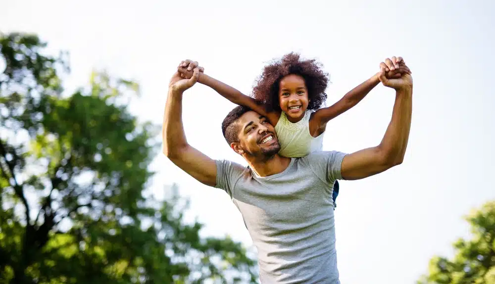 Parents and child enjoying together at outdoor