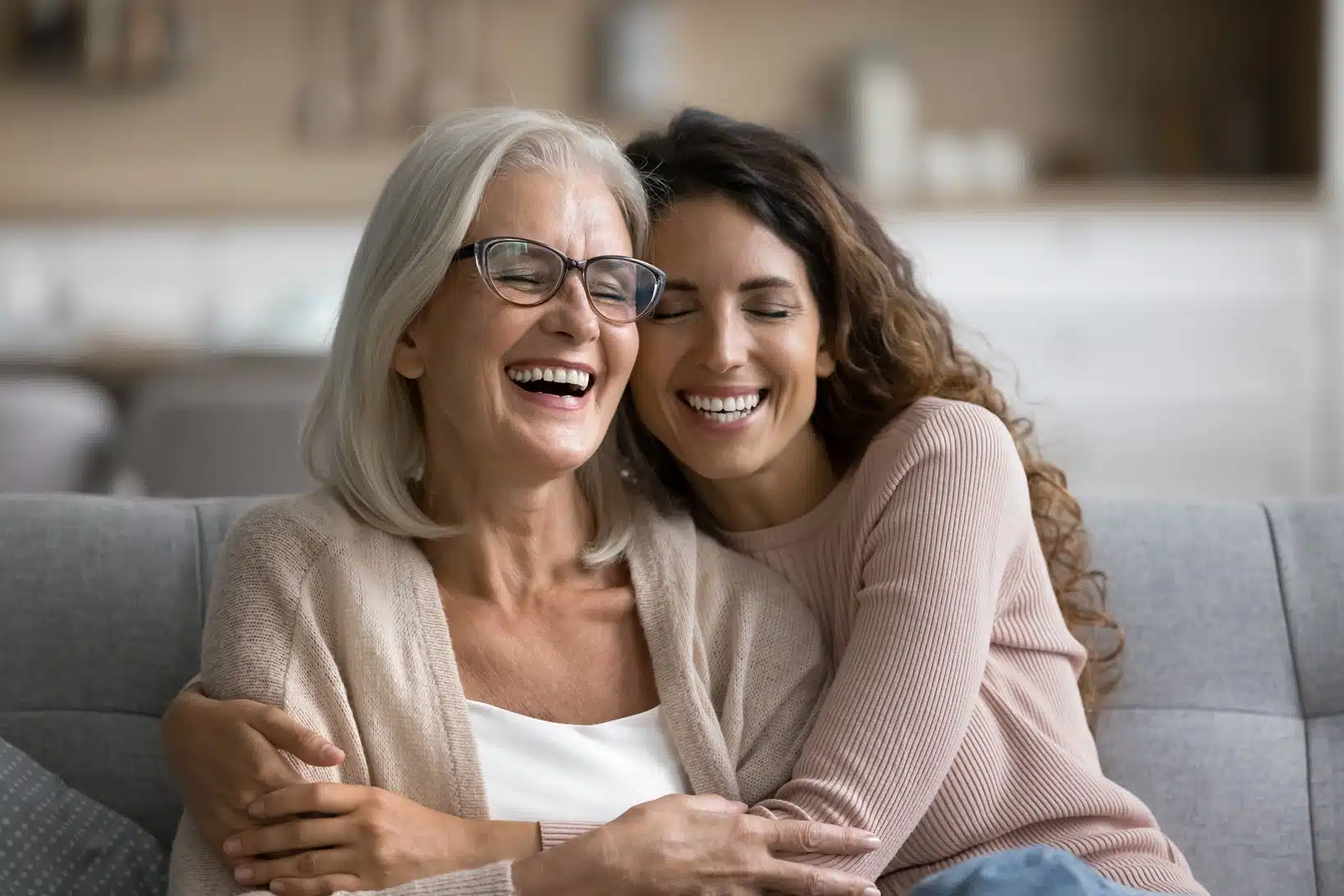 Two people sitting together and enjoying time at home